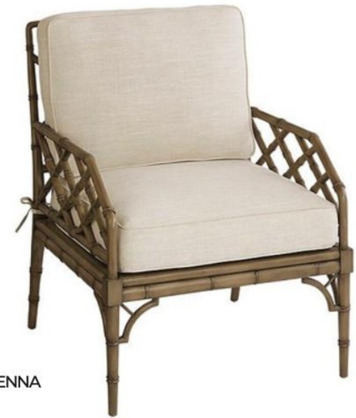 Brown leather armchair with wooden frame