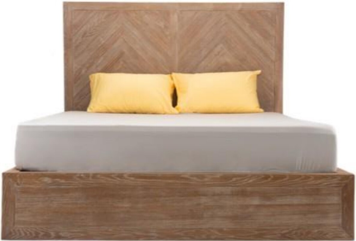Wooden bed with herringbone-pattern headboard